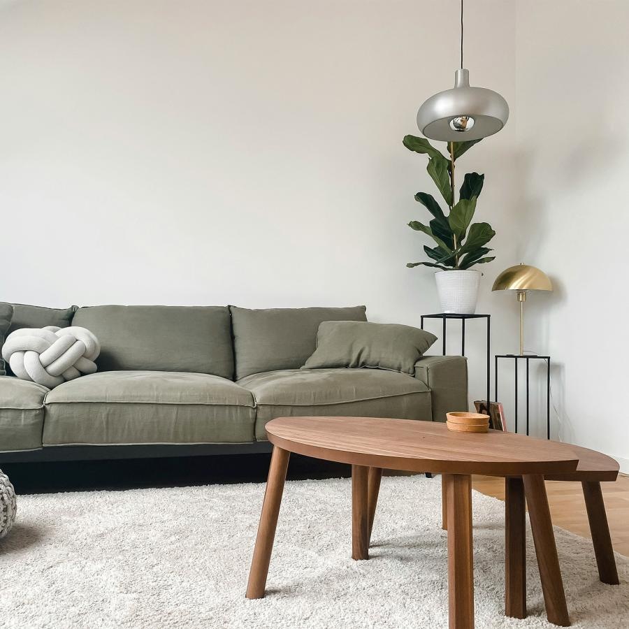 a living room with a couch and a coffee table